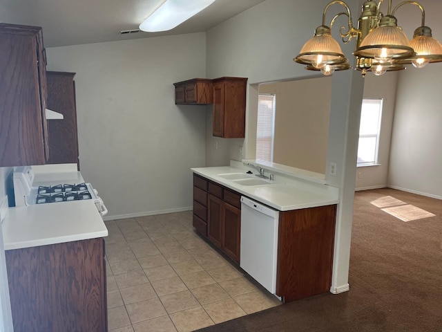 1836 Heidi Ave, Sanger, CA 93657 - kitchen featuring a sink, baseboards, an inviting chandelier, white appliances, and light countertops