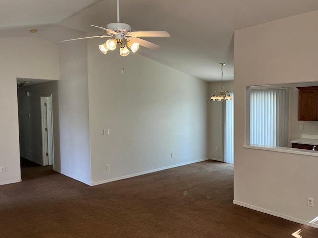 1836 Heidi Ave, Sanger, CA 93657 - unfurnished living room featuring dark carpet, baseboards, vaulted ceiling, and ceiling fan with notable chandelier