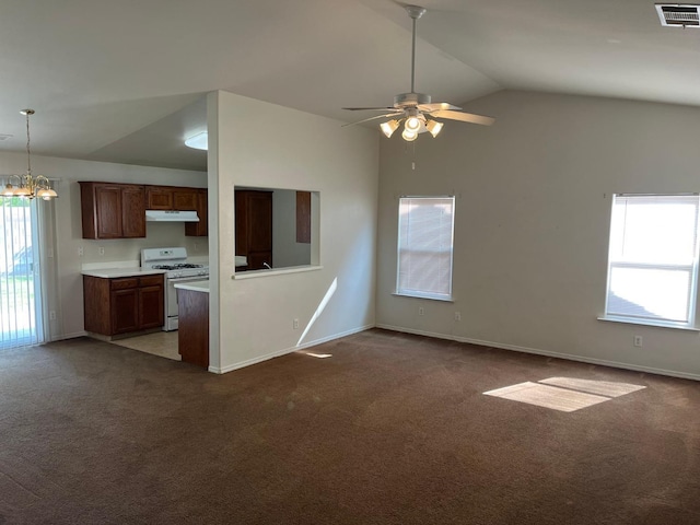 1836 Heidi Ave, Sanger, CA 93657 - kitchen with under cabinet range hood, visible vents, carpet floors, and gas range gas stove