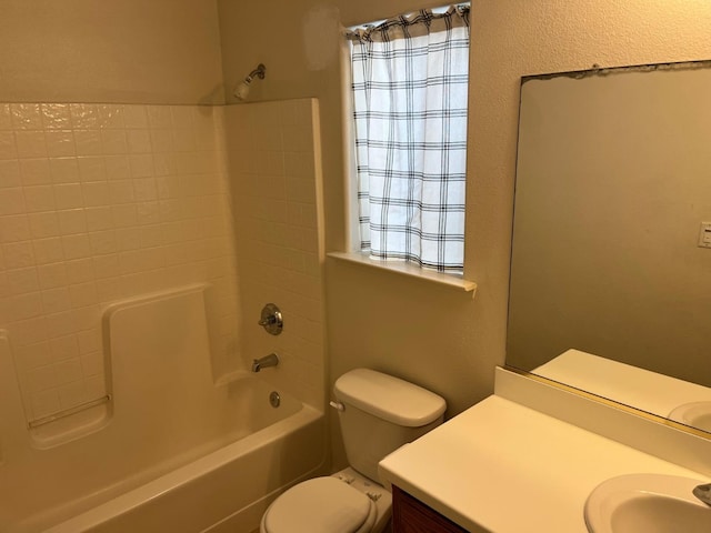 1836 Heidi Ave, Sanger, CA 93657 - bathroom featuring toilet, vanity, and bathtub / shower combination