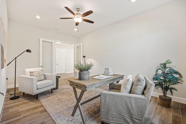 11182 N Via Ravenna Dr, Fresno, CA 93730 - office featuring baseboards, a ceiling fan, wood finished floors, and recessed lighting