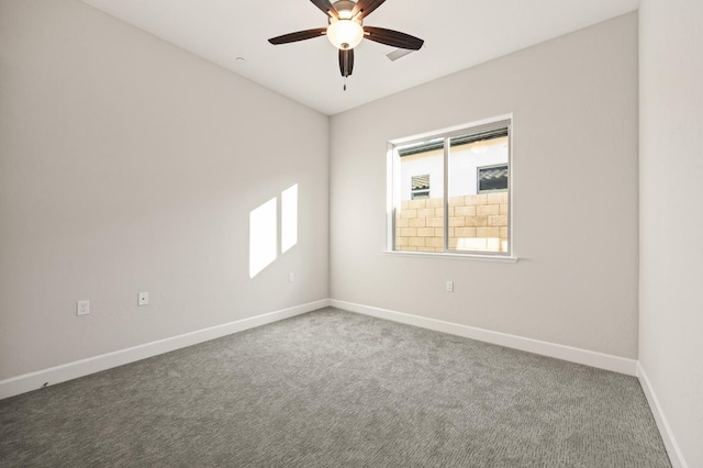 11182 N Via Ravenna Dr, Fresno, CA 93730 - spare room featuring ceiling fan, baseboards, and a healthy amount of sunlight