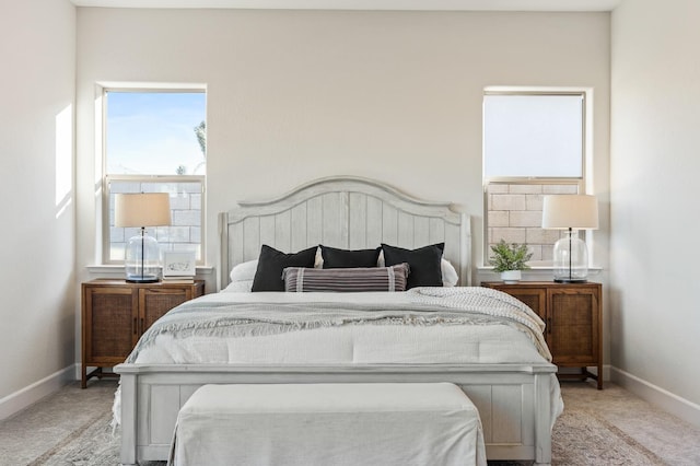 11182 N Via Ravenna Dr, Fresno, CA 93730 - bedroom featuring light carpet and baseboards