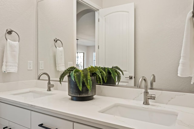 11182 N Via Ravenna Dr, Fresno, CA 93730 - bathroom featuring double vanity and a sink