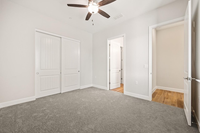 11182 N Via Ravenna Dr, Fresno, CA 93730 - unfurnished bedroom featuring visible vents, a closet, baseboards, carpet flooring, and ceiling fan