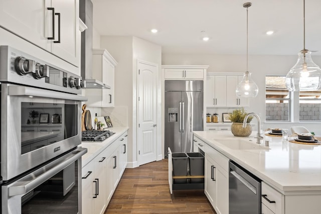 11182 N Via Ravenna Dr, Fresno, CA 93730 - kitchen featuring white cabinets, dark wood-style flooring, stainless steel appliances, and a sink