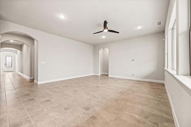 6294 E Miillie Dr, Fresno, CA 93727 - unfurnished room with arched walkways, visible vents, ceiling fan, and recessed lighting