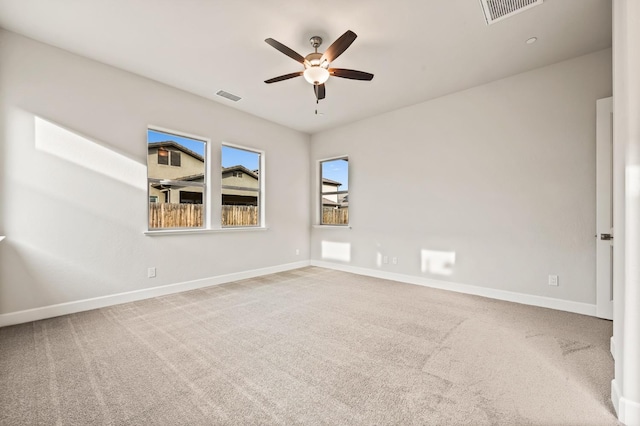 6294 E Miillie Dr, Fresno, CA 93727 - unfurnished room featuring baseboards, a ceiling fan, visible vents, and carpet