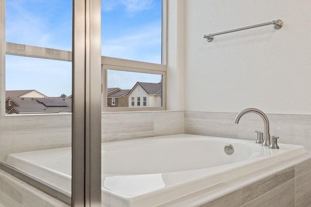 bathroom featuring a garden tub