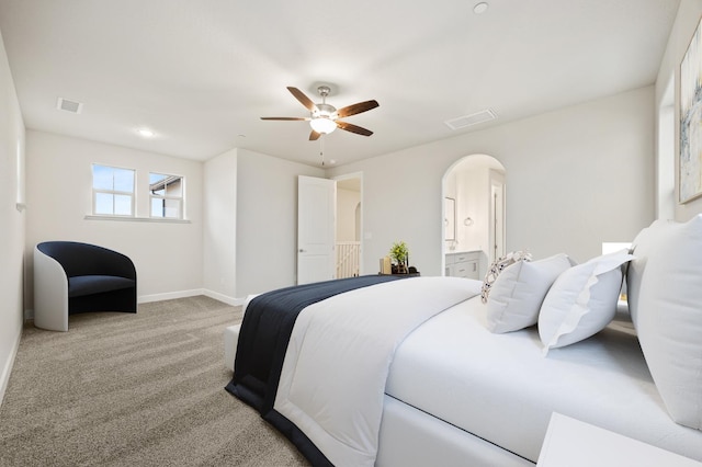 4288 N Phoenix, Fresno, CA 93723 - bedroom featuring carpet, ceiling fan, arched walkways, and ensuite bath