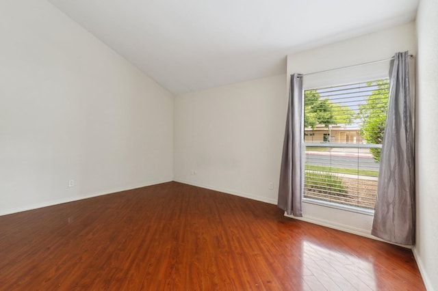 7178 N Fruit Ave Unit 132, Fresno, CA 93711 - spare room with baseboards and wood finished floors