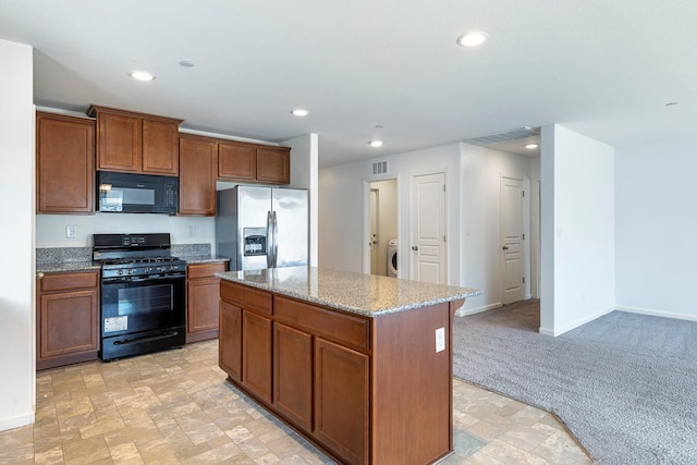 kitchen with black appliances, recessed lighting, baseboards, light carpet, and light stone countertops