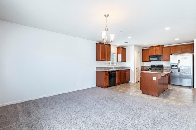 kitchen with black appliances, light colored carpet, a center island, a sink, and pendant lighting