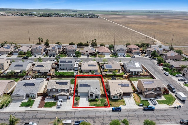 aerial view of residential area with property boundaries highlighted