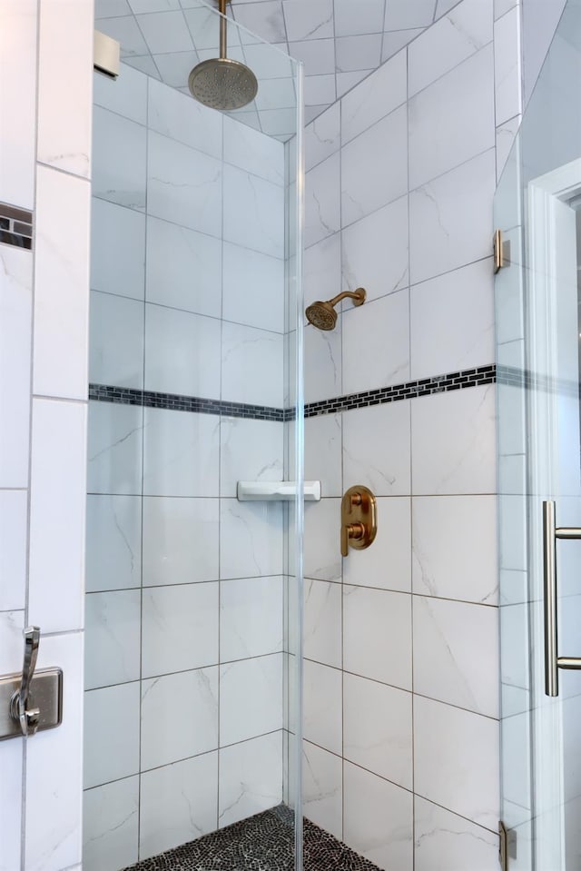 bathroom featuring a stall shower