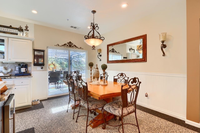 dining area with visible vents, wainscoting, baseboards, recessed lighting, and speckled floor