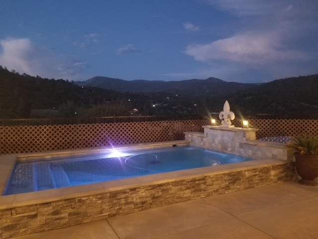42038 Empty Creek Rd, Oakhurst, CA 93644 - view of pool featuring a mountain view and a hot tub