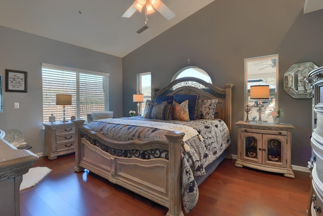 bedroom featuring high vaulted ceiling, a ceiling fan, wood finished floors, and visible vents