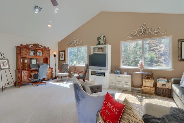carpeted living room featuring visible vents, a ceiling fan, and high vaulted ceiling