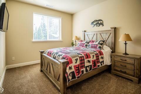 carpeted bedroom with visible vents and baseboards