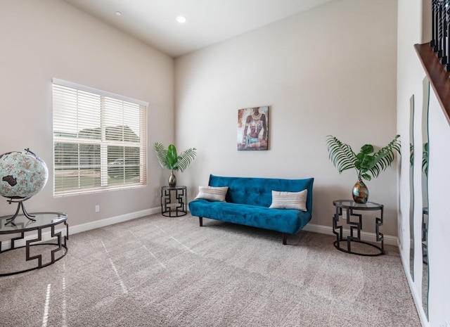 sitting room featuring baseboards, carpet, and recessed lighting