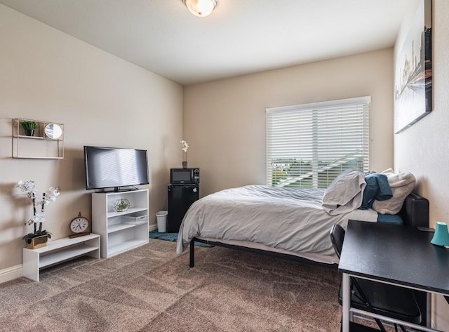 bedroom featuring carpet