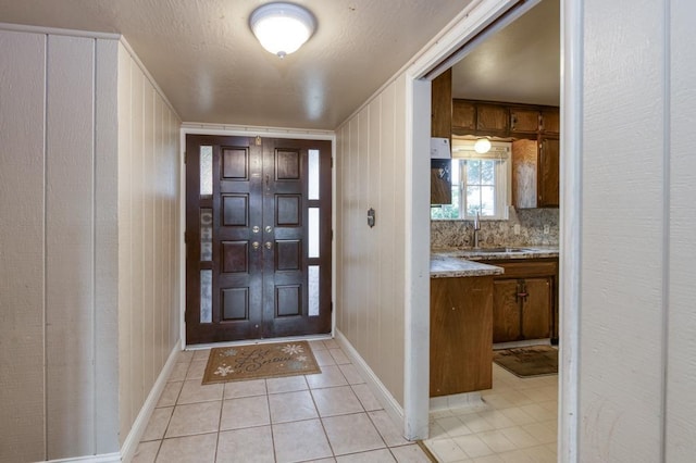 7341 N Bond St, Fresno, CA 93720 - entrance foyer featuring baseboards and light tile patterned floors
