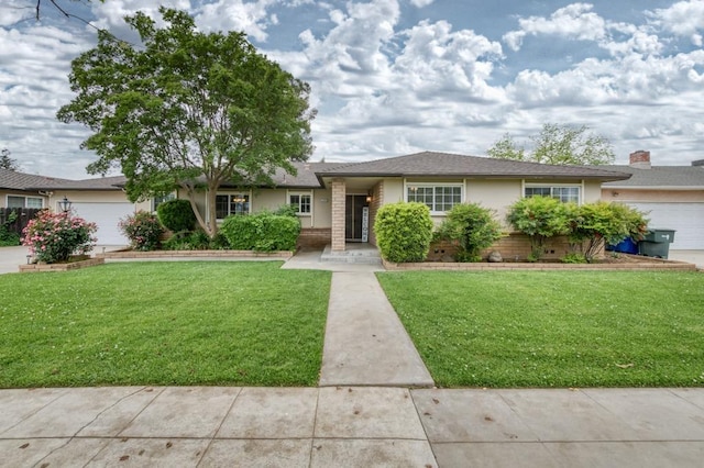 7341 N Bond St, Fresno, CA 93720 - ranch-style home with stucco siding, an attached garage, and a front lawn