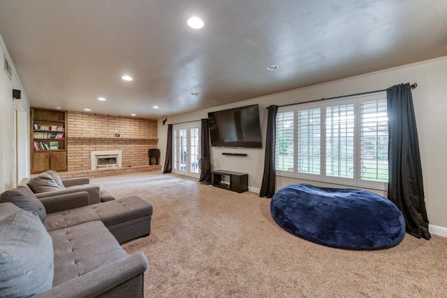 7341 N Bond St, Fresno, CA 93720 - living area featuring baseboards, recessed lighting, a fireplace, and carpet