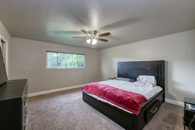 7341 N Bond St, Fresno, CA 93720 - bedroom featuring carpet floors, a ceiling fan, and baseboards