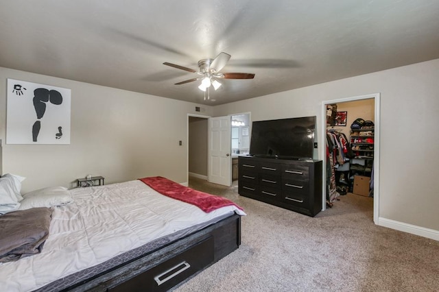 7341 N Bond St, Fresno, CA 93720 - carpeted bedroom with a closet, a walk in closet, ceiling fan, baseboards, and visible vents