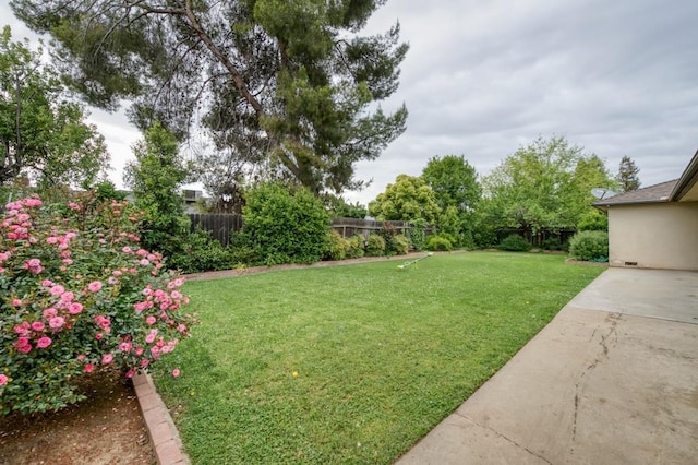 7341 N Bond St, Fresno, CA 93720 - view of yard with a fenced backyard and a patio