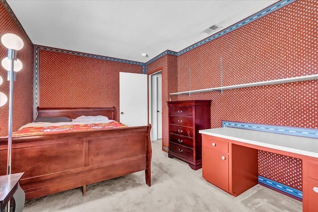 bedroom with light carpet, visible vents, and wallpapered walls