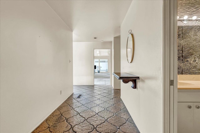 hallway with baseboards