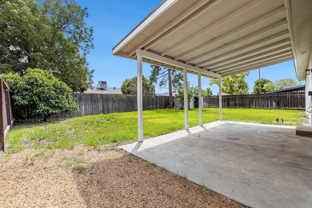 view of yard featuring a fenced backyard and a patio