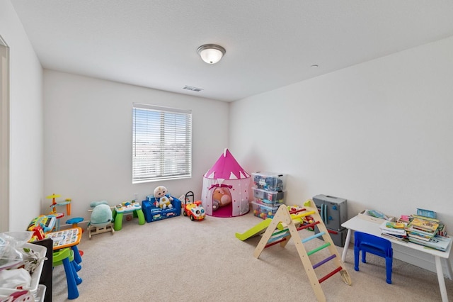 6082 E Homan Ave, Fresno, CA 93727 - recreation room featuring carpet flooring