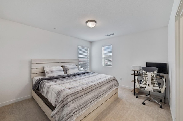6082 E Homan Ave, Fresno, CA 93727 - carpeted bedroom with baseboards and a desk
