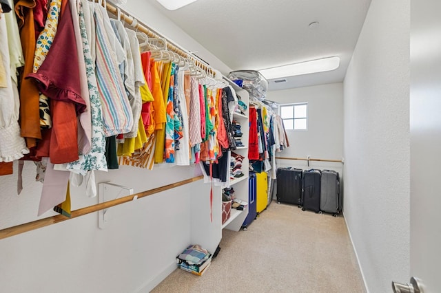 6082 E Homan Ave, Fresno, CA 93727 - walk in closet featuring carpet floors