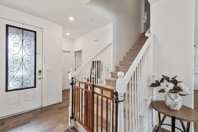 6082 E Homan Ave, Fresno, CA 93727 - foyer featuring wood finished floors, recessed lighting, and stairs