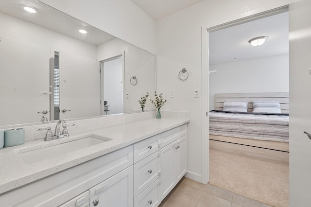 6082 E Homan Ave, Fresno, CA 93727 - bathroom with vanity, tile patterned floors, and recessed lighting