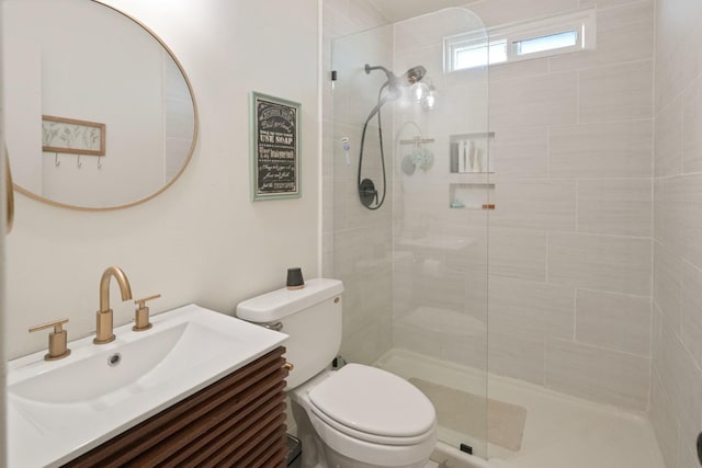 1016 N White St, Hanford, CA 93230 - bathroom with vanity, toilet, and tiled shower