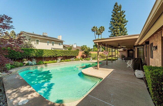 7355 N Pacific Ave, Fresno, CA 93711 - view of swimming pool with a fenced in pool, a fenced backyard, a patio, and ceiling fan