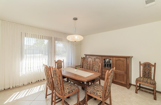 7355 N Pacific Ave, Fresno, CA 93711 - dining area featuring light tile patterned flooring and visible vents