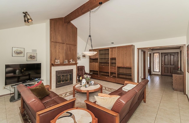 7355 N Pacific Ave, Fresno, CA 93711 - living area featuring a tile fireplace, visible vents, light tile patterned flooring, beamed ceiling, and high vaulted ceiling