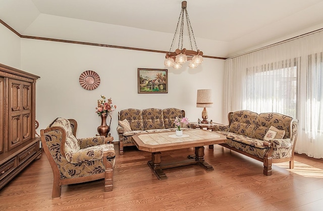 7355 N Pacific Ave, Fresno, CA 93711 - living room featuring a chandelier and light wood-style floors