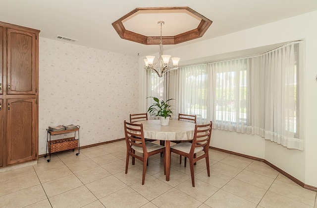 7355 N Pacific Ave, Fresno, CA 93711 - dining room with a raised ceiling, baseboards, a chandelier, and light tile patterned floors