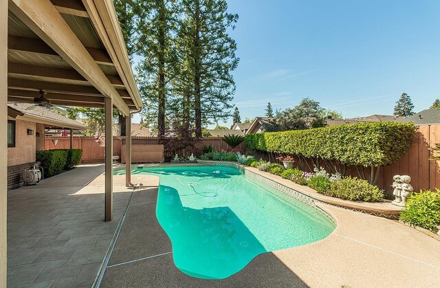 7355 N Pacific Ave, Fresno, CA 93711 - view of swimming pool featuring a patio area, a fenced in pool, and a fenced backyard