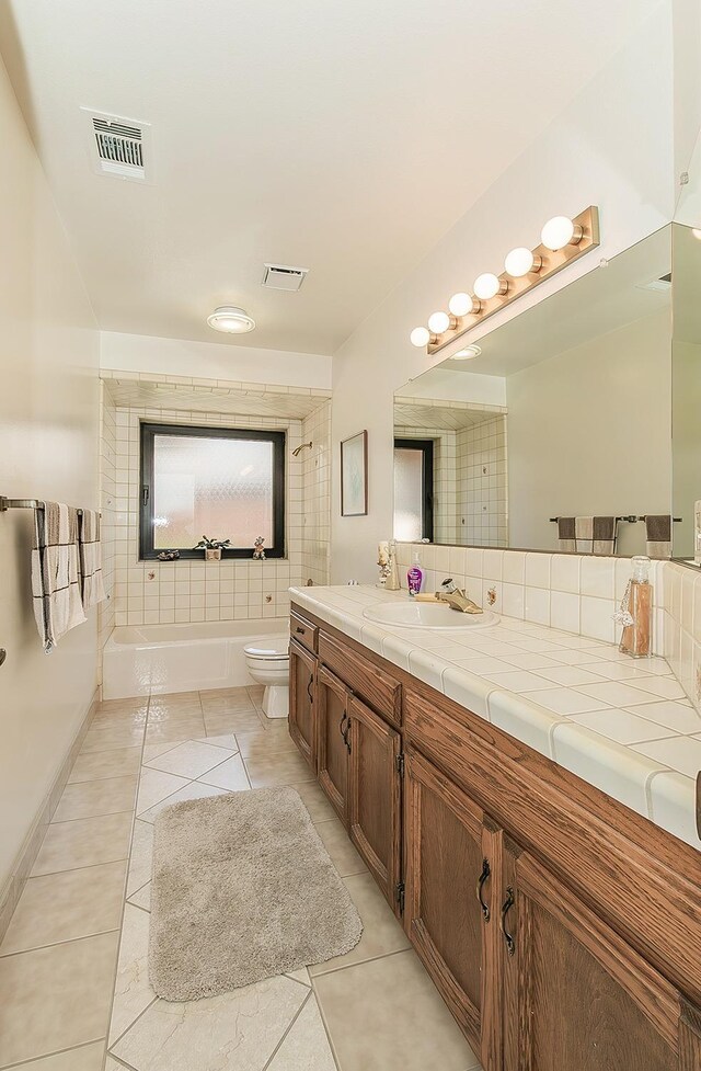 7355 N Pacific Ave, Fresno, CA 93711 - full bath featuring toilet, vanity, tile patterned floors, and visible vents