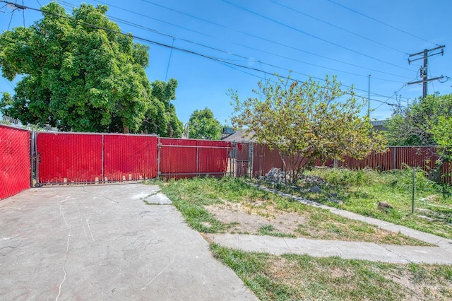 view of yard with fence and a patio area