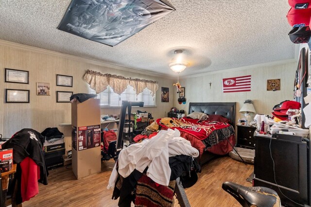 4311 N Emerson Ave, Fresno, CA 93705 - bedroom featuring crown molding, wood finished floors, and a textured ceiling